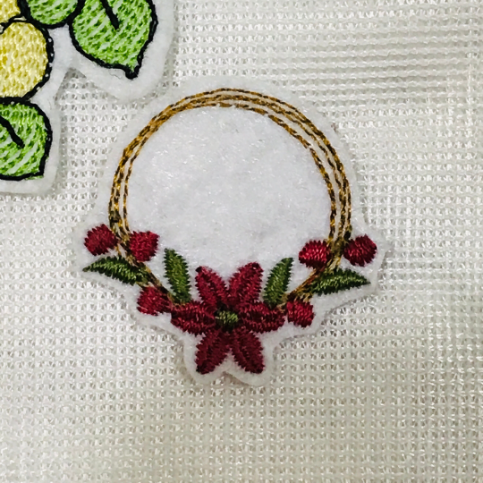 Poinsettia wreath embroidery design